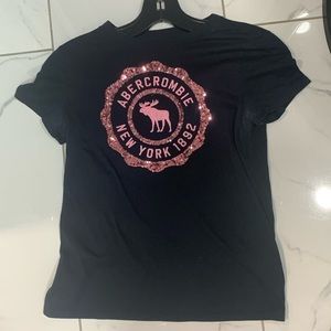 Navy blue t shirt with pink glittery design